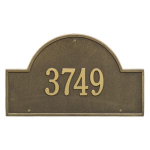 A house plaque with the number 3 7 4 9.