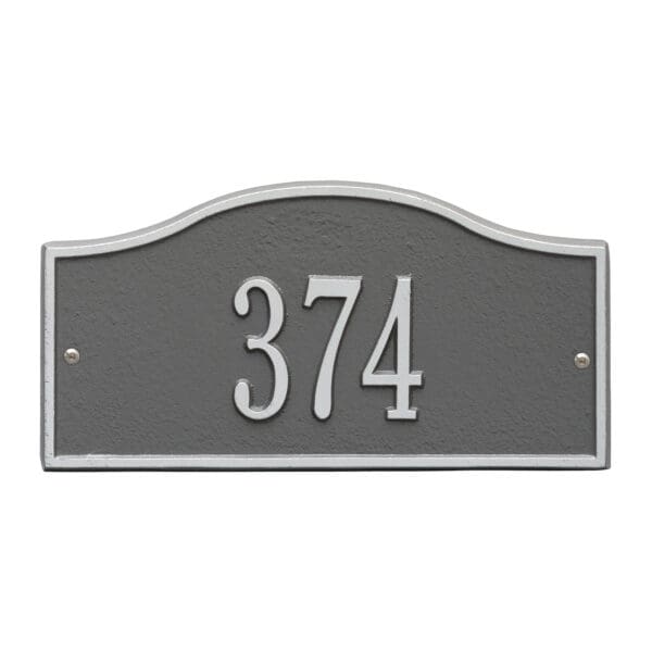 A house plaque with the number 3 7 4