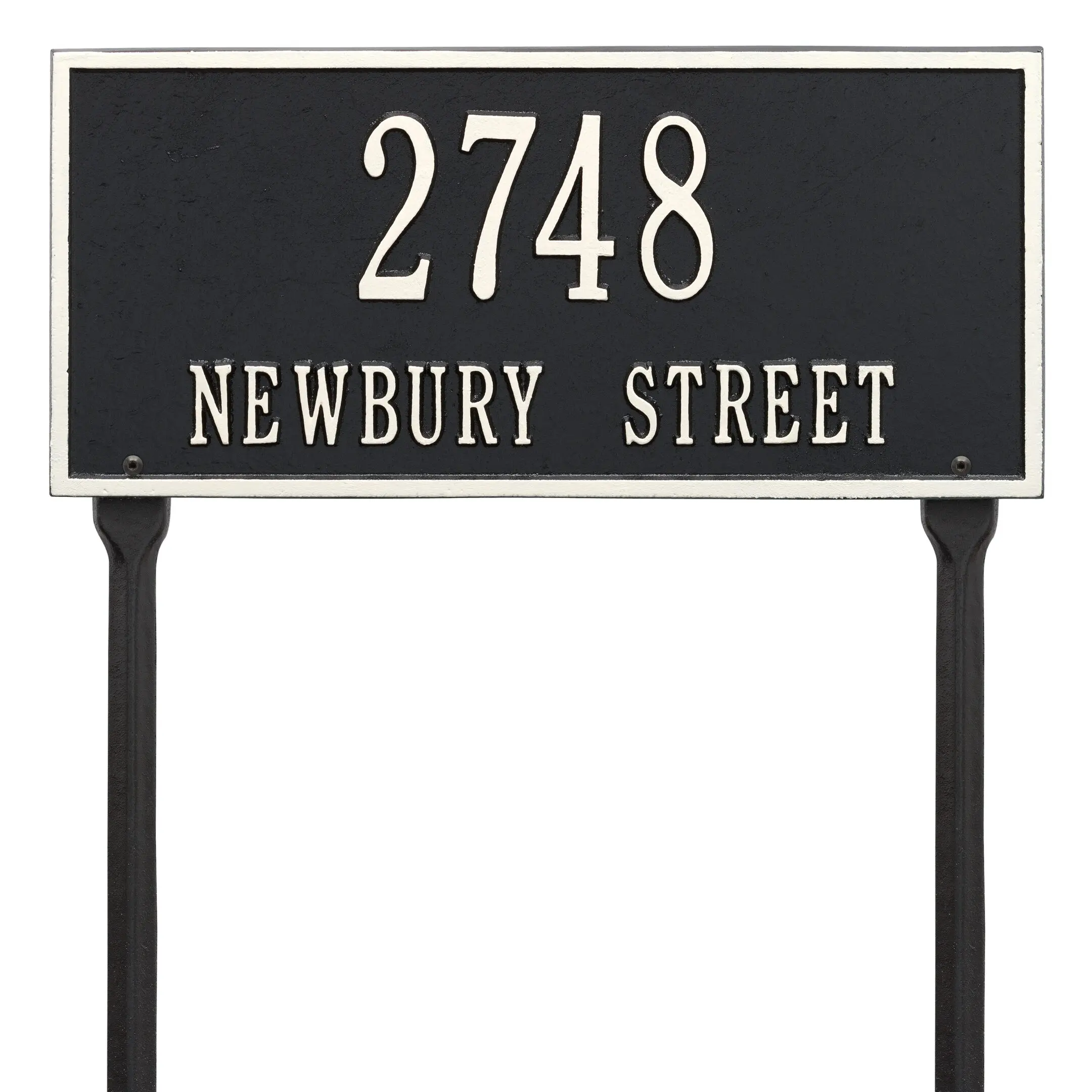 A black and white sign with numbers on it